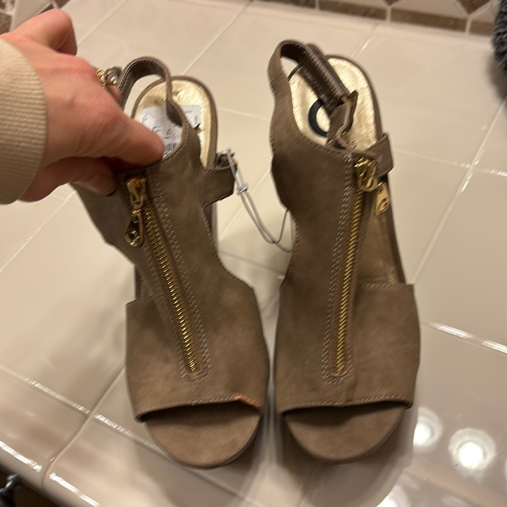 - Guess platform heals. Brand new with tags. Never worn